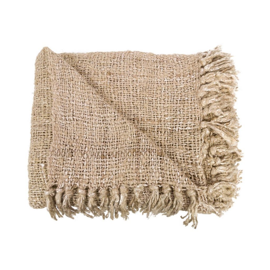 Plaid Le s'il vous Beige en coton tissé main avec franges posé sur canapé