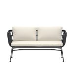 Canapé lounge Isaure noir avec structure en acier et coussins beiges, banquette de jardin design contemporain pour terrasse ou balcon