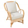 Fauteuil en rotin Nantucket avec coussin déhoussable, accoudoirs et structure en rotin naturel.