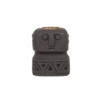Bougeoir Sumba Stone 2326 en pierre noire sculpté à la main avec visage stylisé inspiration statue indonésienne