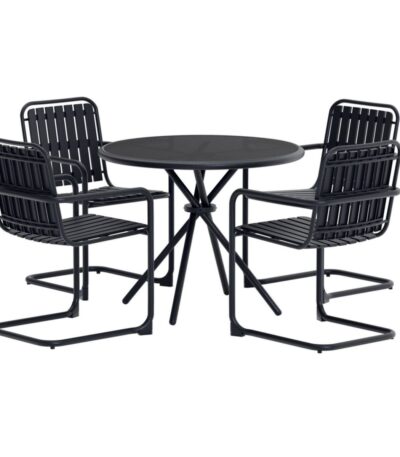 Ensemble repas Chelsy avec table ronde et quatre chaises en métal.