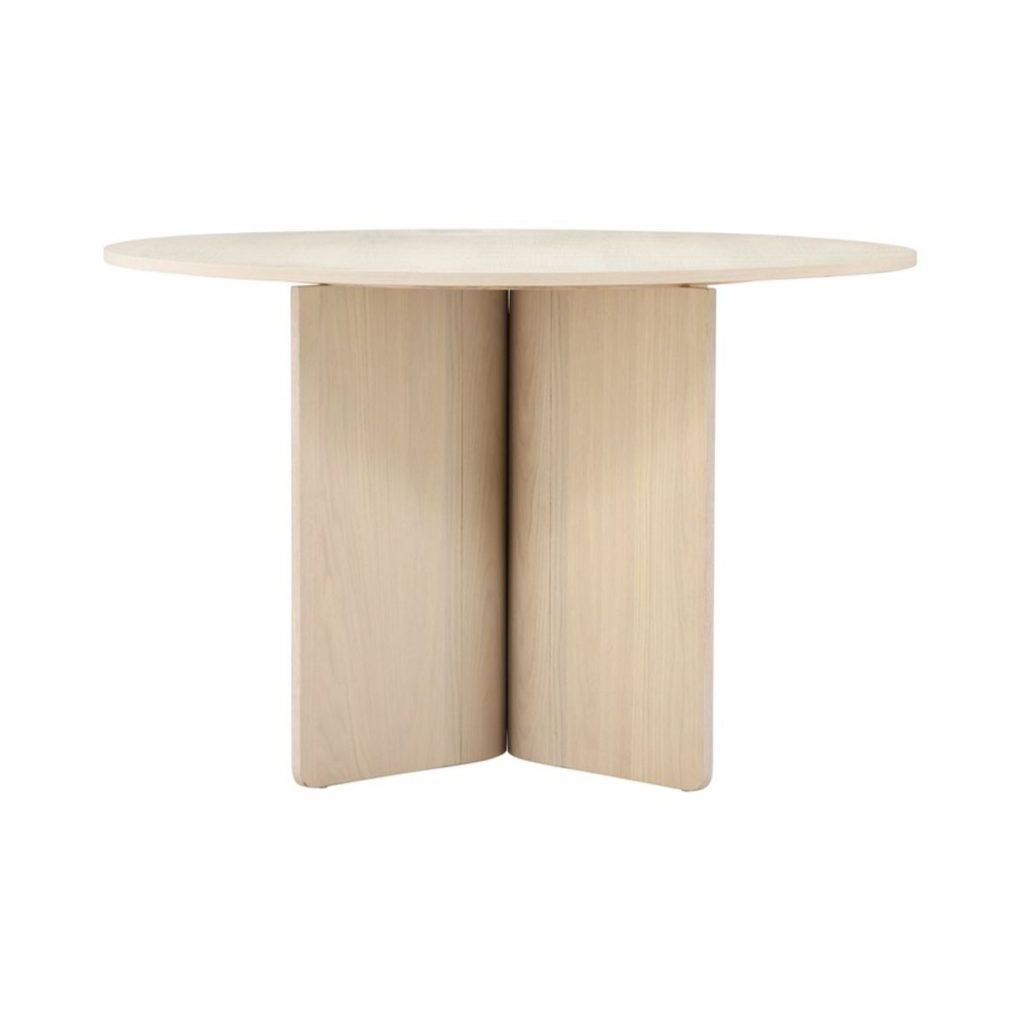 Table ronde Tyra blanchi en bois clair avec pied central, table à manger design épuré