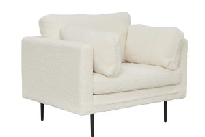 Fauteuil de salon Bosco blanc teddy avec assise profonde et revêtement texturé dans un intérieur contemporain