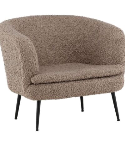 Fauteuil de salon Noth en tissu bouclé beige avec pieds acier noir dans un intérieur contemporain