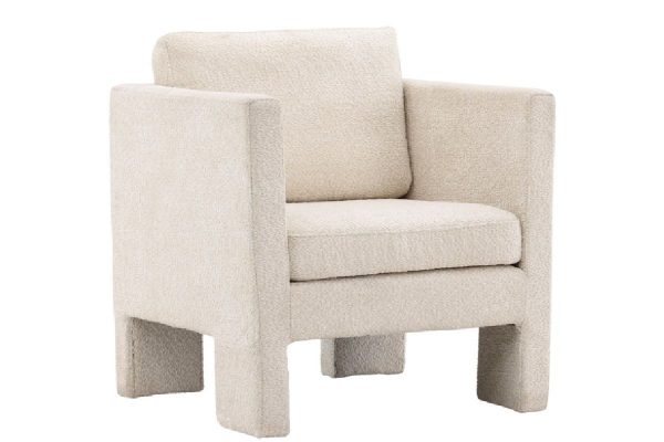 Fauteuil de salon blanc Raids en tissu bouclé avec accoudoirs hauts et coussins amovibles dans un intérieur contemporain