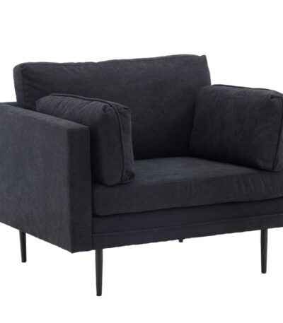 Fauteuil de salon noir Bosco en tissu avec coussins généreux et pieds fins en acier dans un intérieur contemporain