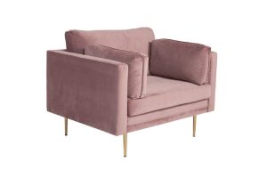 Fauteuil de salon rose Bosco en velours avec assise profonde et coussins dans un intérieur contemporain