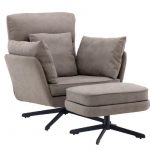Fauteuil gris avec repose-pieds Magalas en tissu bouclé avec coussins et piètement noir dans un salon contemporain