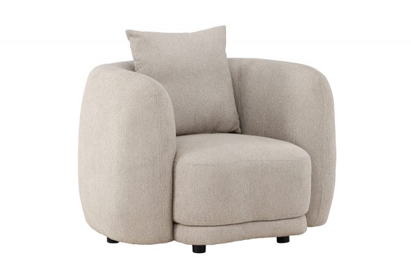 Fauteuil beige Cilio en tissu bouclé avec assise large, coussin de dossier et lignes arrondies